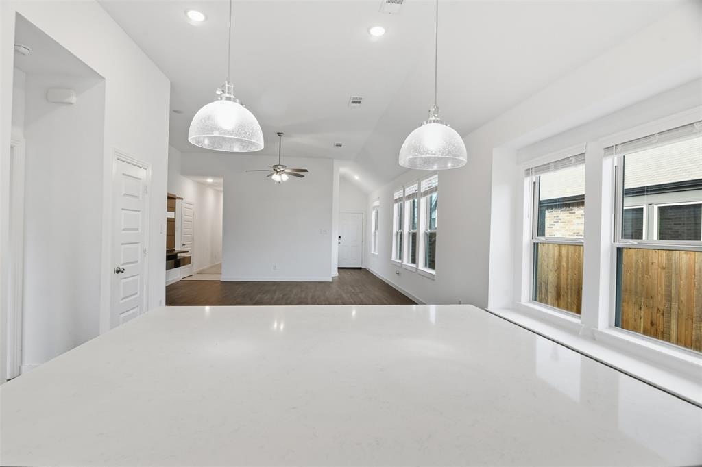 3910 Rochelle Lane Crandall, TX 75114 - Photo 15 of 32 a view of a kitchen with a window