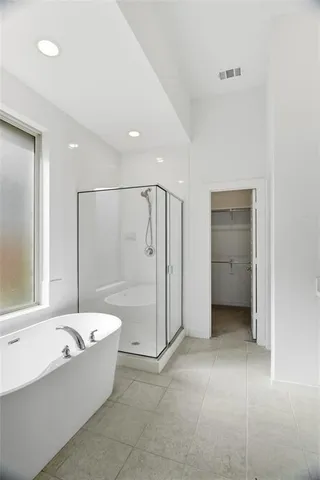 a bathroom with a double vanity sink mirror and double