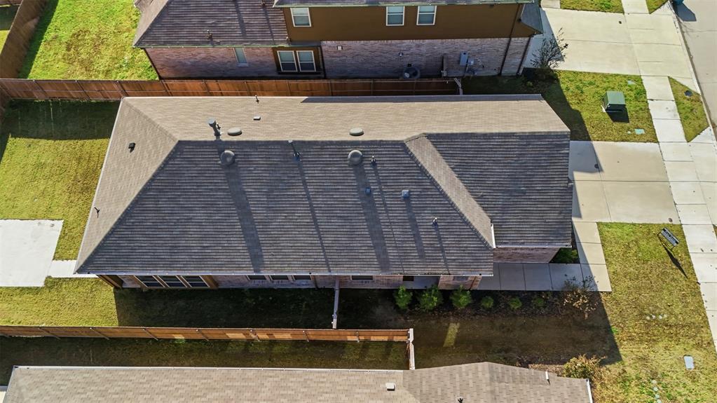 3910 Rochelle Lane Crandall, TX 75114 - Photo 6 of 32 a aerial view of a house with a yard