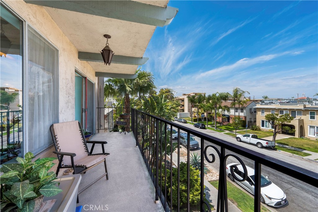 191 Kennebec Avenue, Unit 301 Long Beach, CA 90803 - Photo 12 of 14 a view of a balcony with chairs