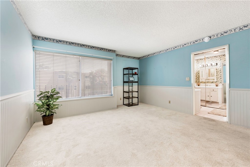 191 Kennebec Avenue, Unit 301 Long Beach, CA 90803 - Photo 7 of 14 an empty room with windows