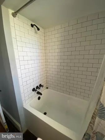a bathroom with a bathtub