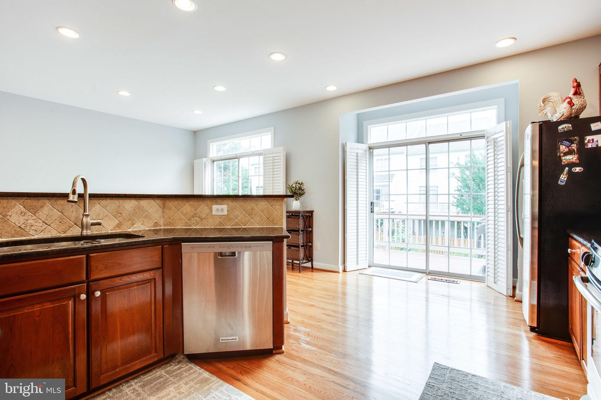 136 Roland Court Southwest Vienna, VA 22180 - Photo 29 of 67 Bright kitchen with beautiful hardwood floors!