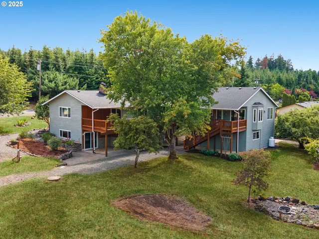 a aerial view of a house with swimming pool and porch