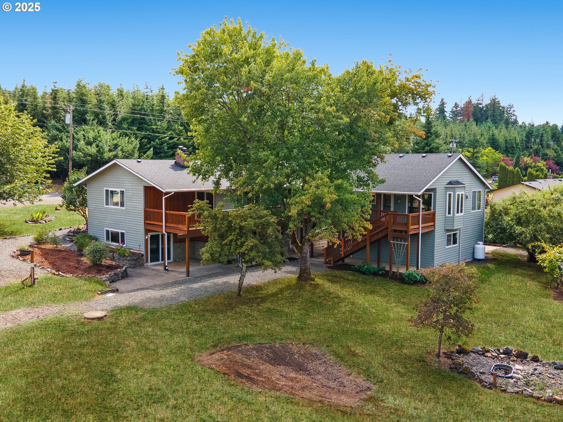 a aerial view of a house with swimming pool and porch