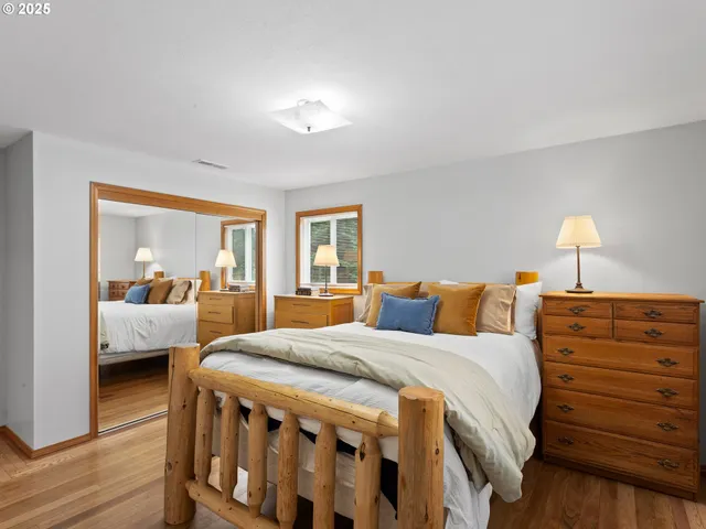 a bedroom with a bed and a view of bedroom