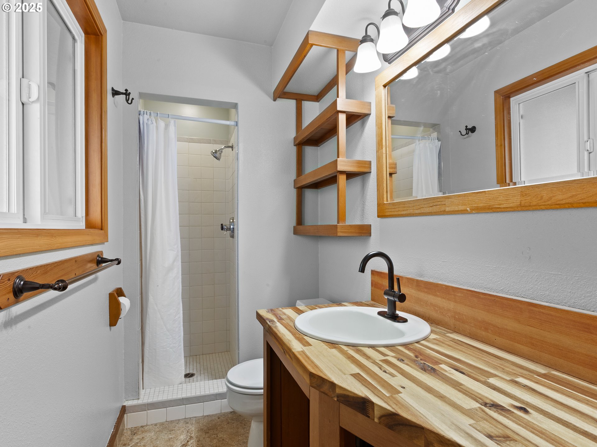 34603 Southeast Jarl Road Boring, OR 97009 - Photo 15 of 48 a bathroom with a sink a toilet and shower