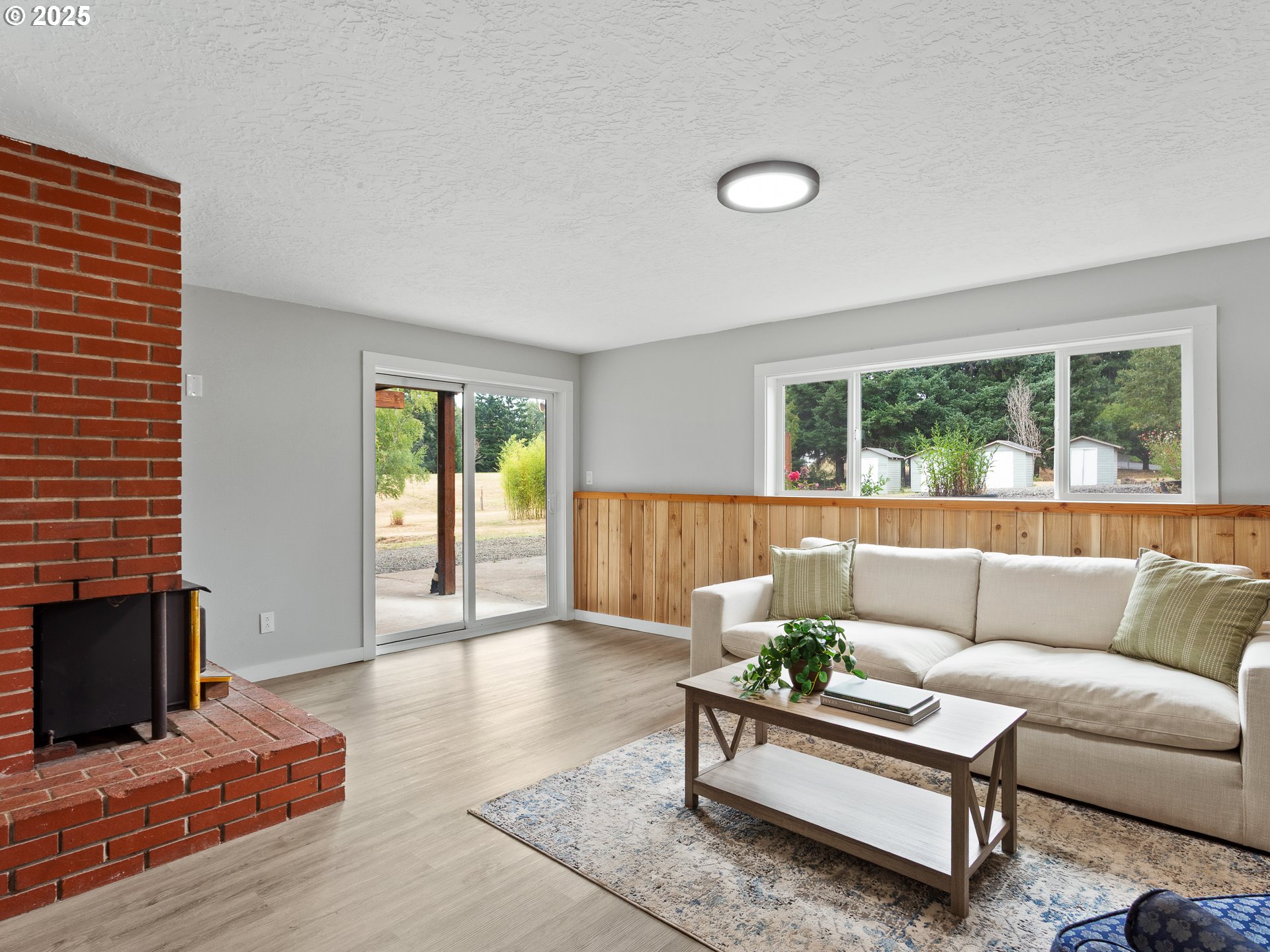 34603 Southeast Jarl Road Boring, OR 97009 - Photo 21 of 48 a living room with furniture and a fireplace