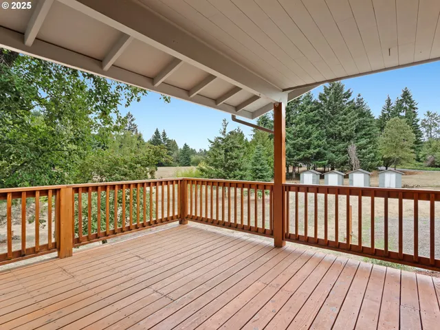 a view of porch with wooden floor