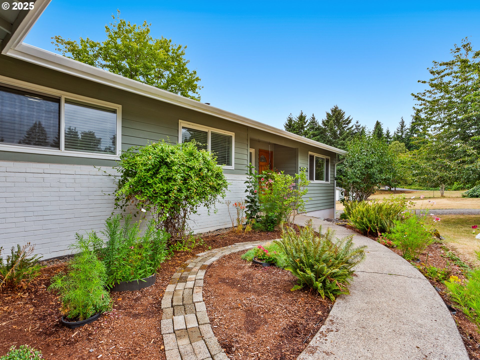 34603 Southeast Jarl Road Boring, OR 97009 - Photo 3 of 48 a front view of a house with a yard