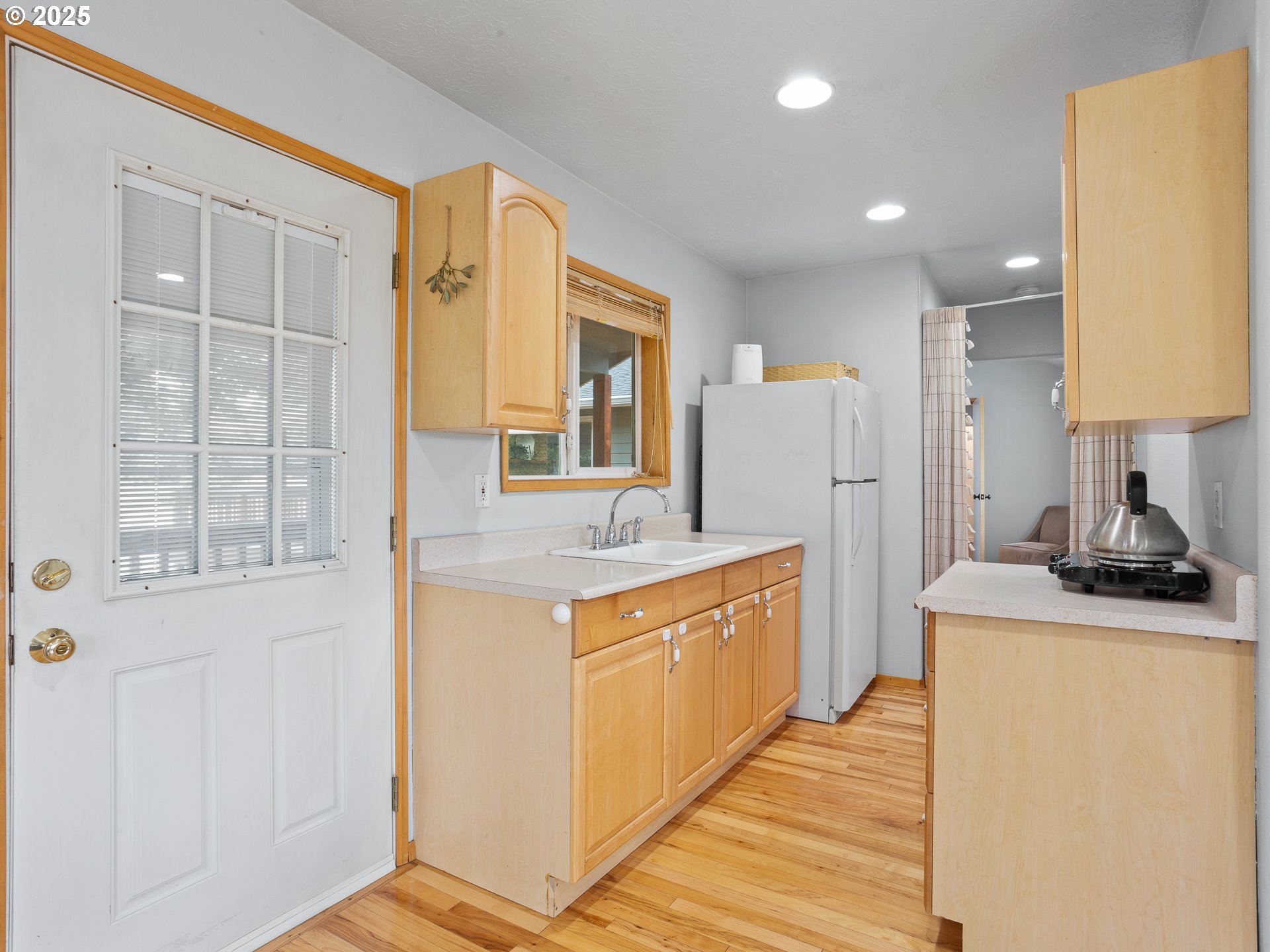 34603 Southeast Jarl Road Boring, OR 97009 - Photo 37 of 48 a large kitchen with stainless steel appliances granite countertop a stove and a sink