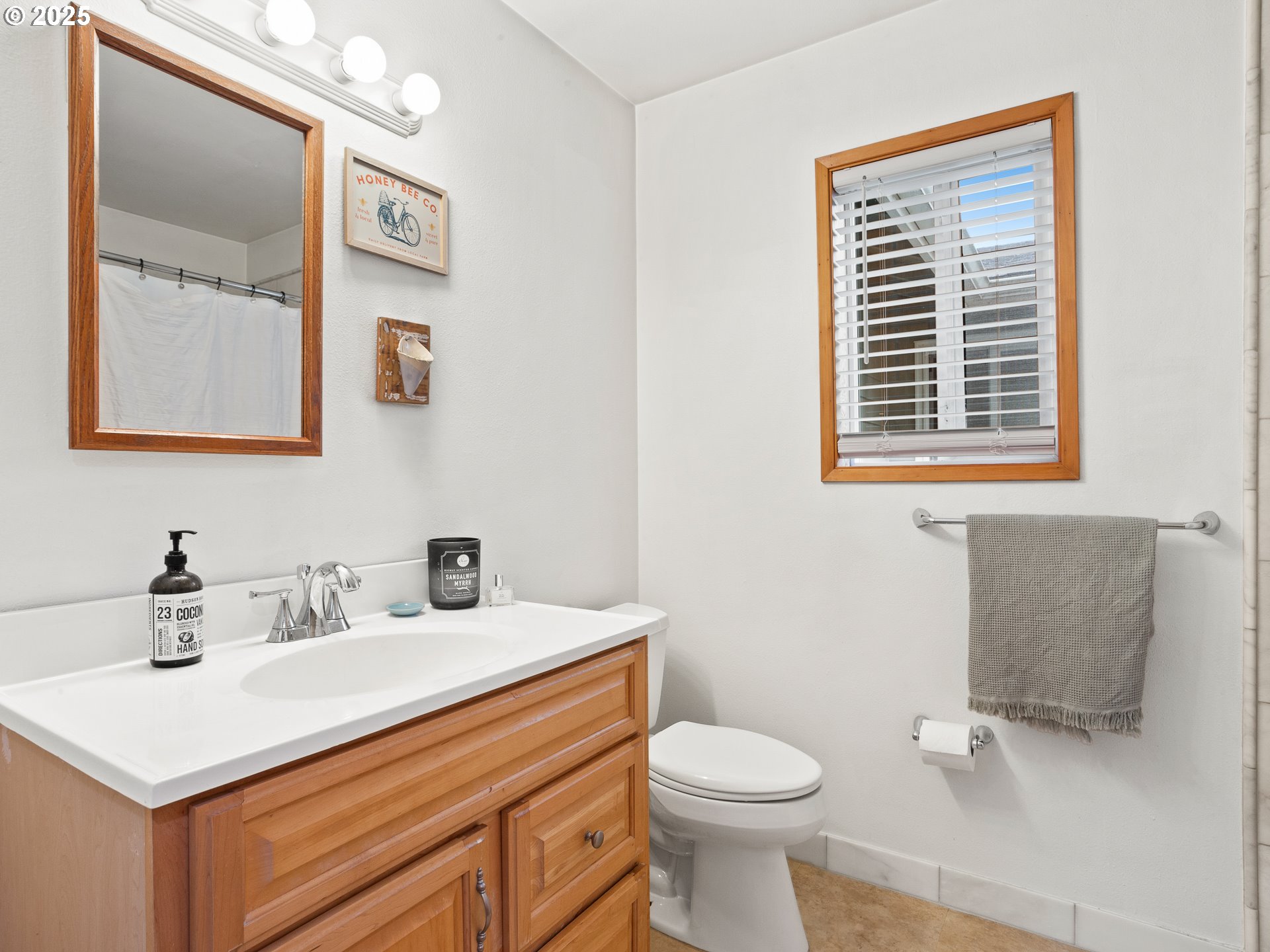 34603 Southeast Jarl Road Boring, OR 97009 - Photo 39 of 48 a bathroom with a sink a toilet and mirror