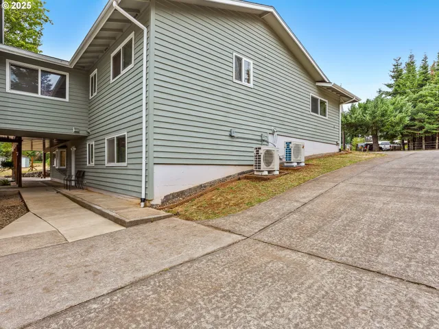 a view of grassy field with trees