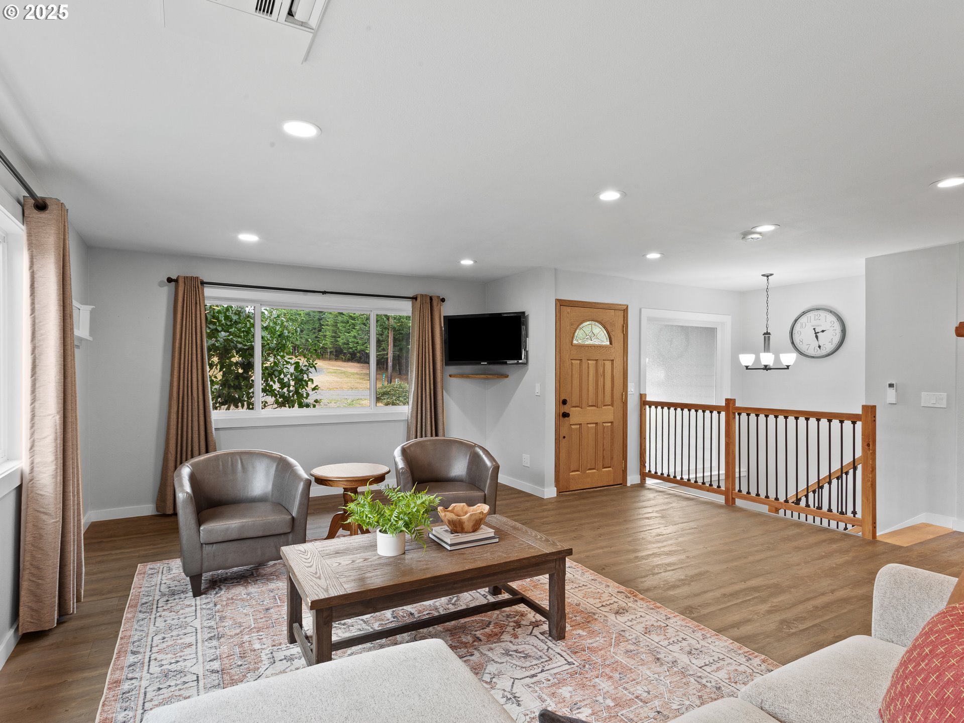 34603 Southeast Jarl Road Boring, OR 97009 - Photo 8 of 48 a living room with furniture and a flat screen tv