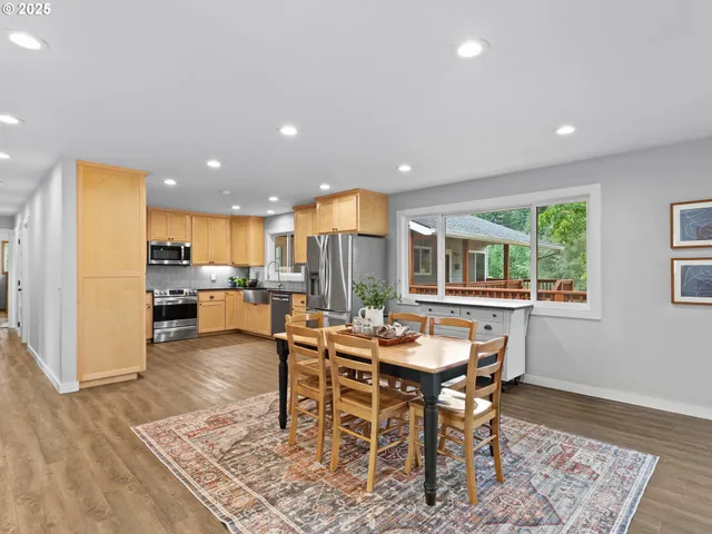 a view of a dining room with furniture