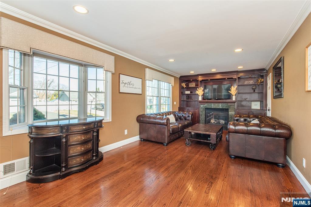 18 Stonycroft Road Wayne, NJ 07470 - Photo 11 of 40 a living room with furniture and a large window