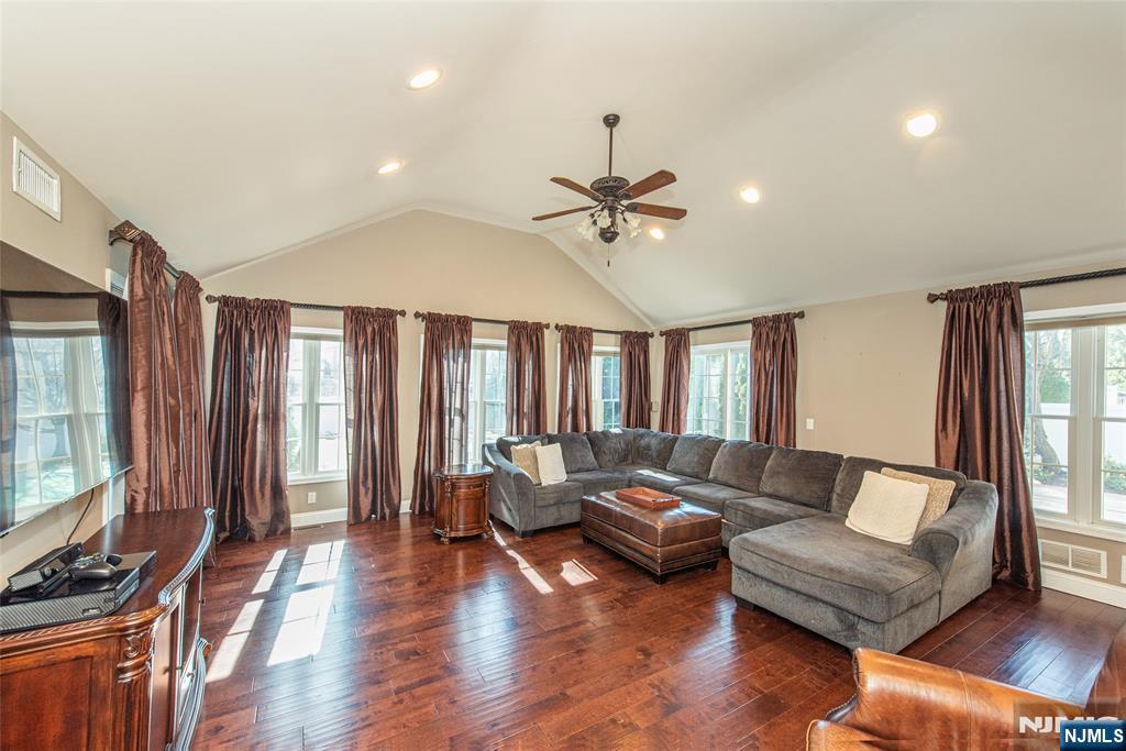 18 Stonycroft Road Wayne, NJ 07470 - Photo 14 of 40 a living room with furniture and a flat screen tv