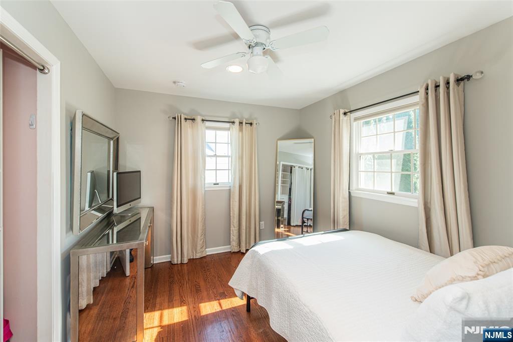 18 Stonycroft Road Wayne, NJ 07470 - Photo 27 of 40 a bedroom with a bed dresser and a window