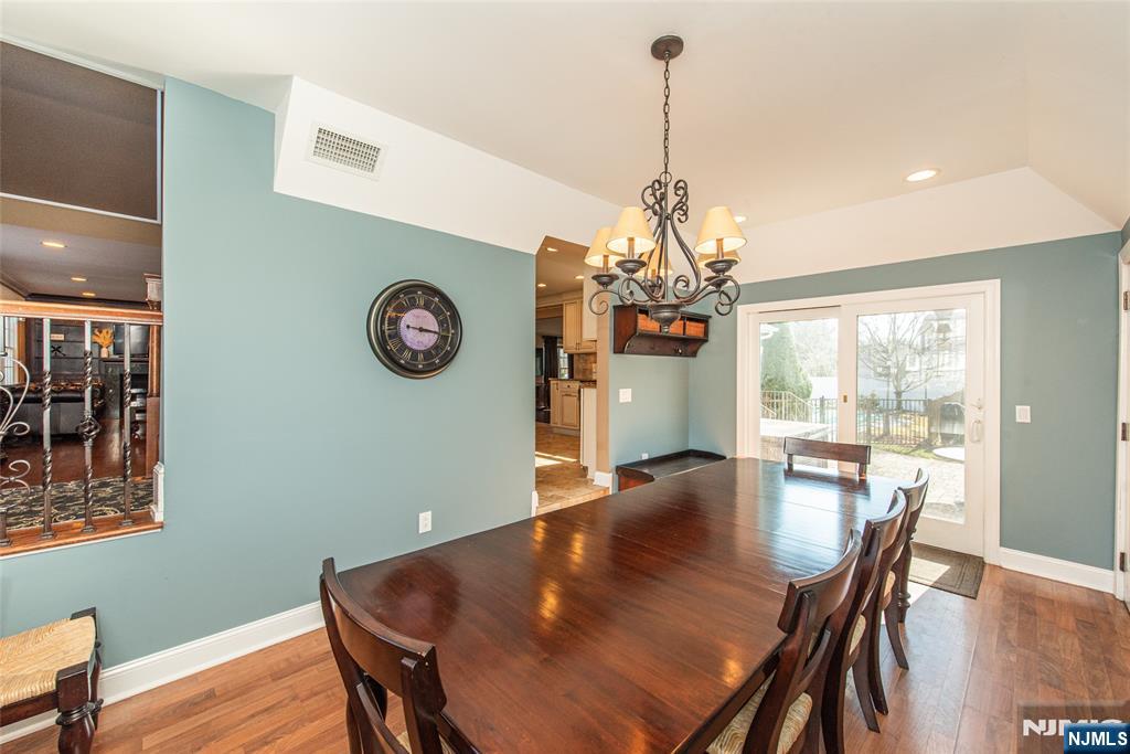 18 Stonycroft Road Wayne, NJ 07470 - Photo 10 of 40 a view of a dining room with furniture window and wooden floor