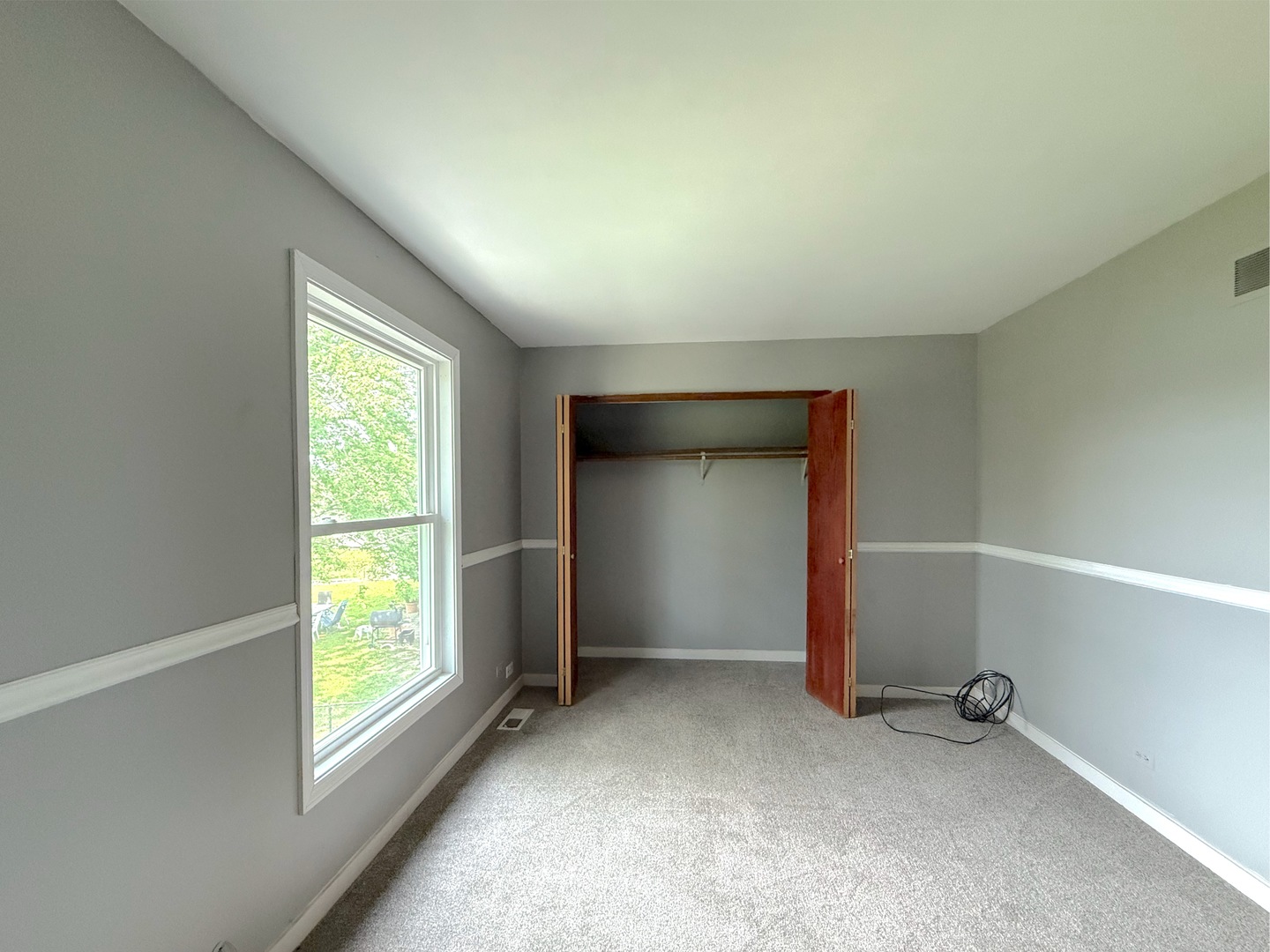 3542 Ronald Road Crete, IL 60417 - Photo 14 of 22 an empty room with windows and closet