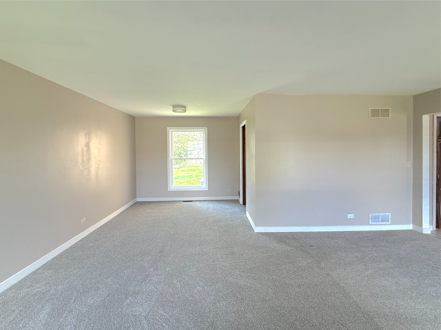 3542 Ronald Road Crete, IL 60417 - Photo 5 of 22 a view of an empty room with a window