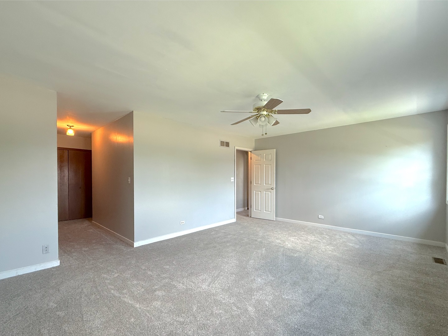 3542 Ronald Road Crete, IL 60417 - Photo 10 of 22 a view of an empty room with a fan