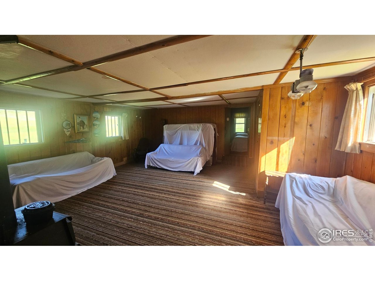 1364 Redbluff Road Livermore, CO 80536 - Photo 18 of 26 a room with two bed and a window