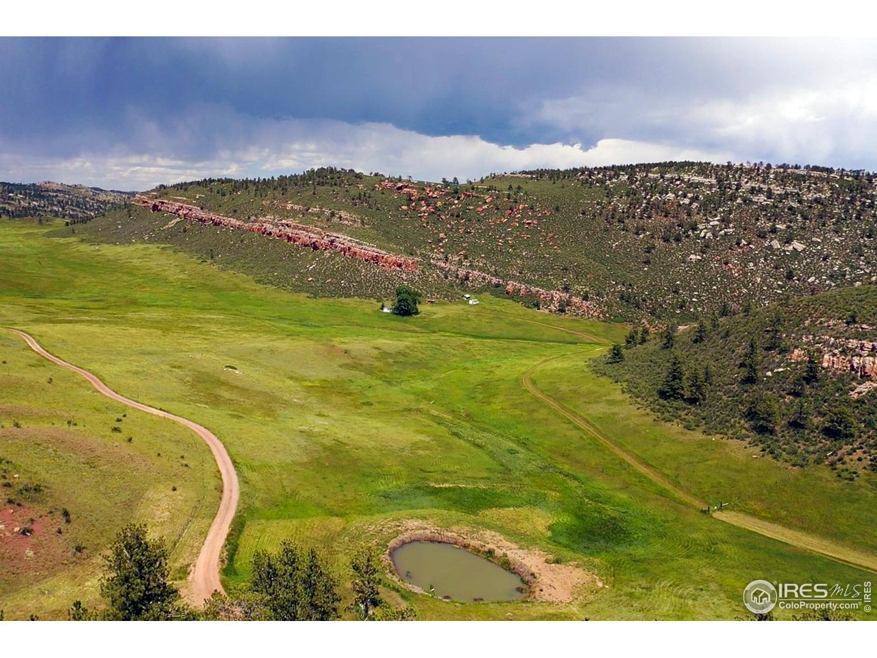 1364 Redbluff Road Livermore, CO 80536 - Photo 25 of 26 a view of an ocean and a mountain