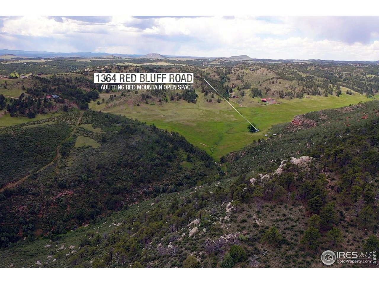 1364 Redbluff Road Livermore, CO 80536 - Photo 26 of 26 a view of a field with an ocean