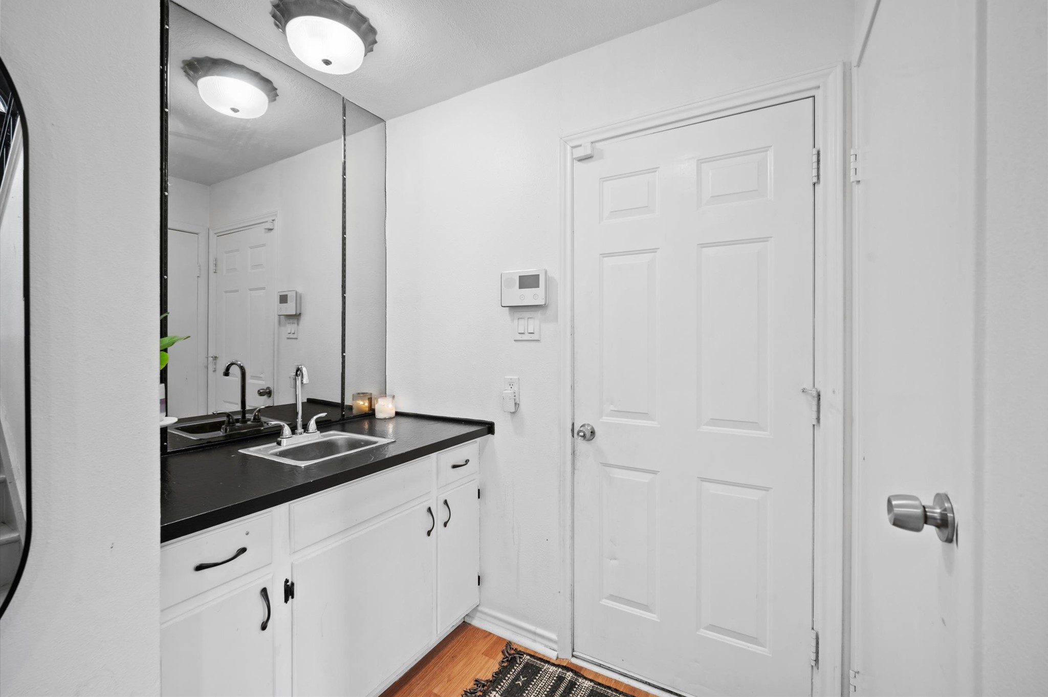 2715 Wood River Road Spring, TX 77373 - Photo 27 of 39 Wet bar off the lower level living space leads to oversized garage!