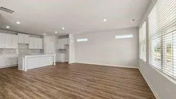 a view of kitchen with wooden floor