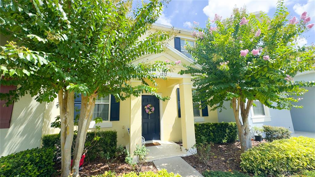 1217 Seburn Road Apopka, FL 32703 - Photo 12 of 61 a front view of a house with garden