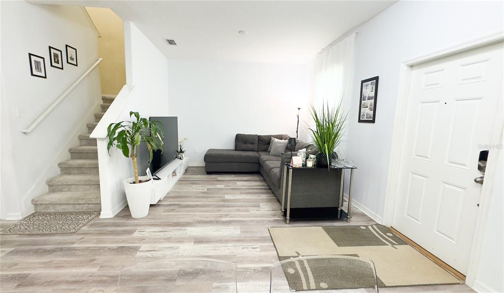 1217 Seburn Road Apopka, FL 32703 - Photo 37 of 61 a view of living room with furniture and a potted plant