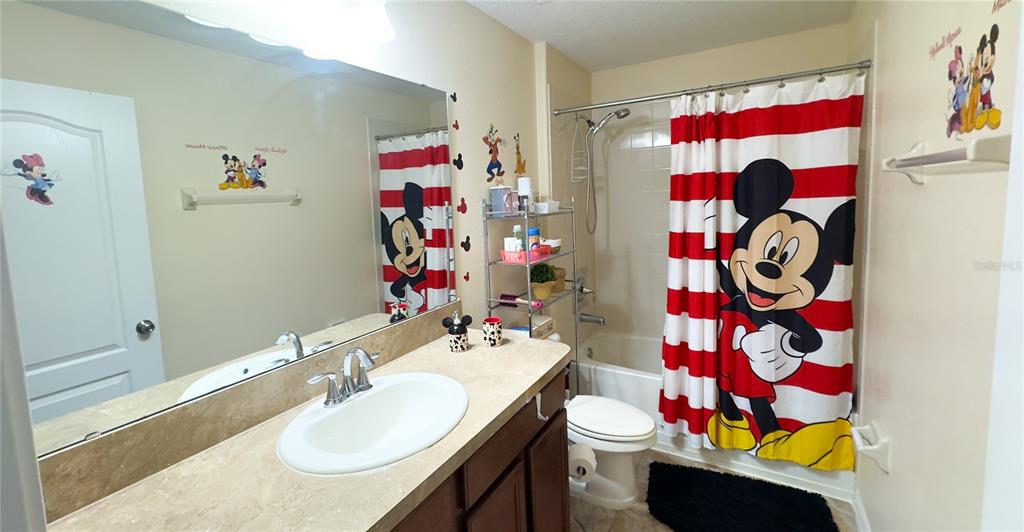 1217 Seburn Road Apopka, FL 32703 - Photo 50 of 61 a bathroom with a sink and a mirror