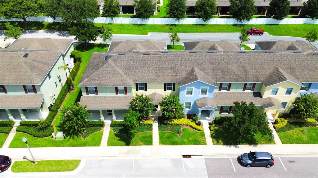 1217 Seburn Road Apopka, FL 32703 - Photo 7 of 61 an aerial view of a house with a yard and a garden