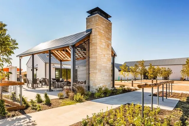 a view of swimming pool with outdoor seating