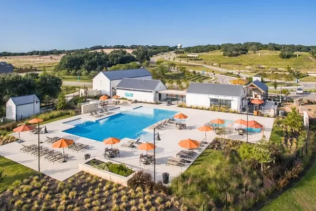 a view of a city with an ocean view