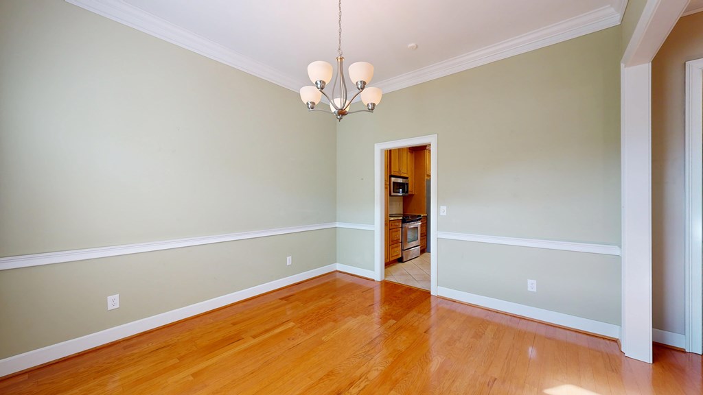 4608 Baltusrol Court Columbus, GA 31909 - Photo 14 of 76 wooden floor in an empty room with a window