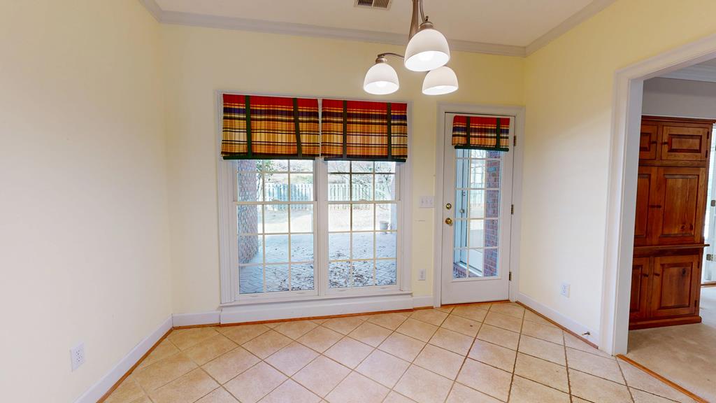 4608 Baltusrol Court Columbus, GA 31909 - Photo 19 of 76 a view of an empty room with window