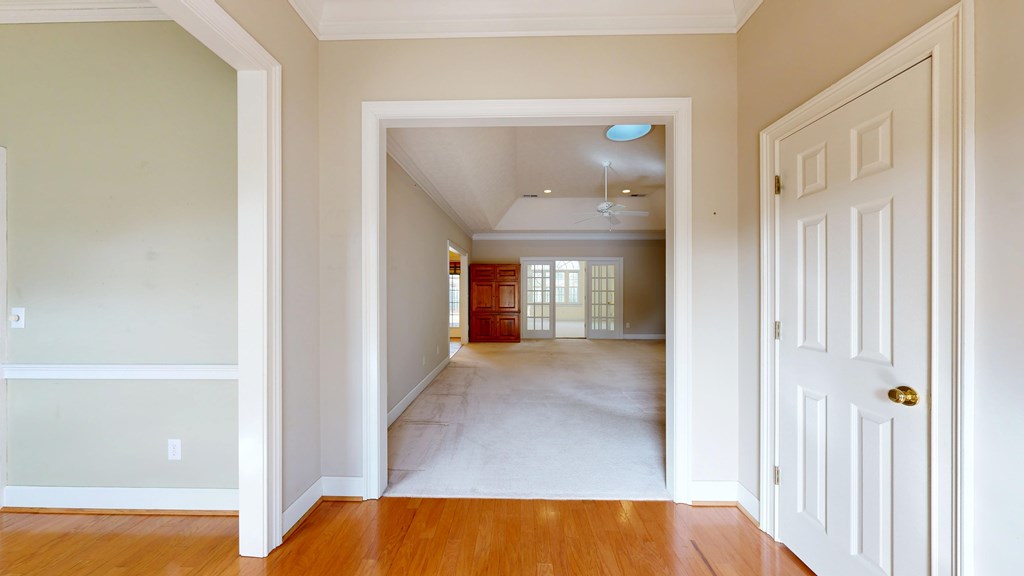 4608 Baltusrol Court Columbus, GA 31909 - Photo 2 of 76 a view of a hallway with furniture and a window