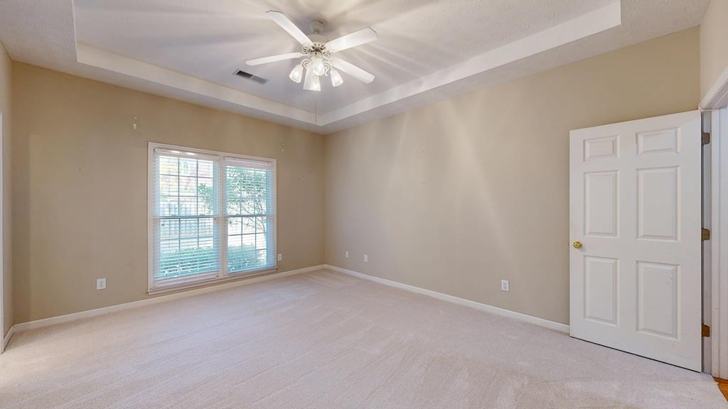 4608 Baltusrol Court Columbus, GA 31909 - Photo 32 of 76 an empty room with windows and fan