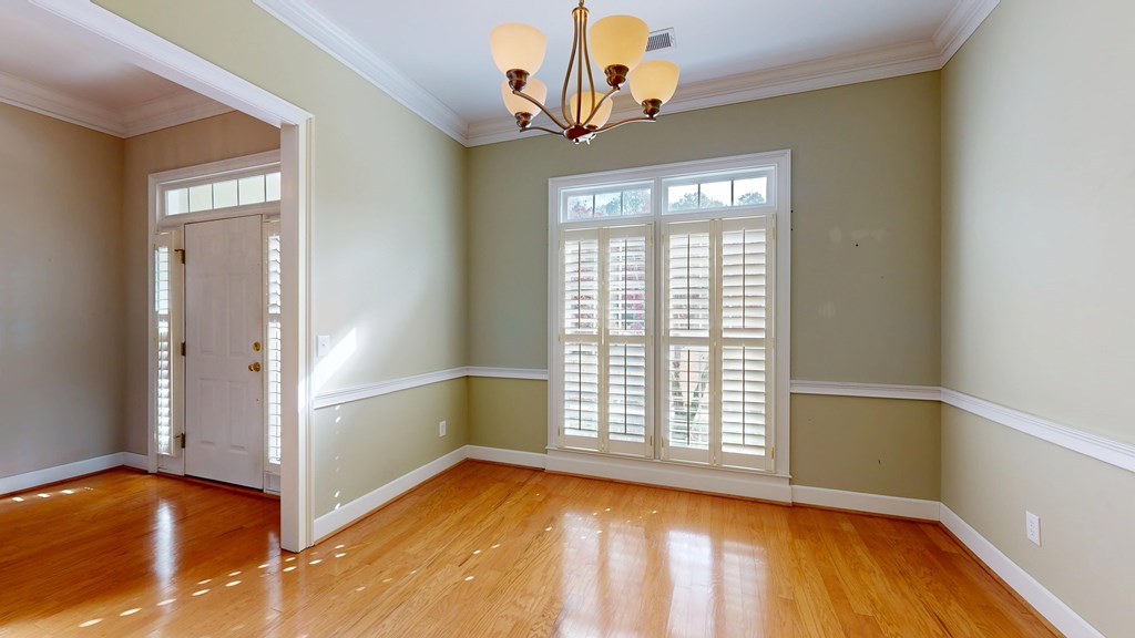 4608 Baltusrol Court Columbus, GA 31909 - Photo 4 of 76 a view of empty room with wooden floor and fan