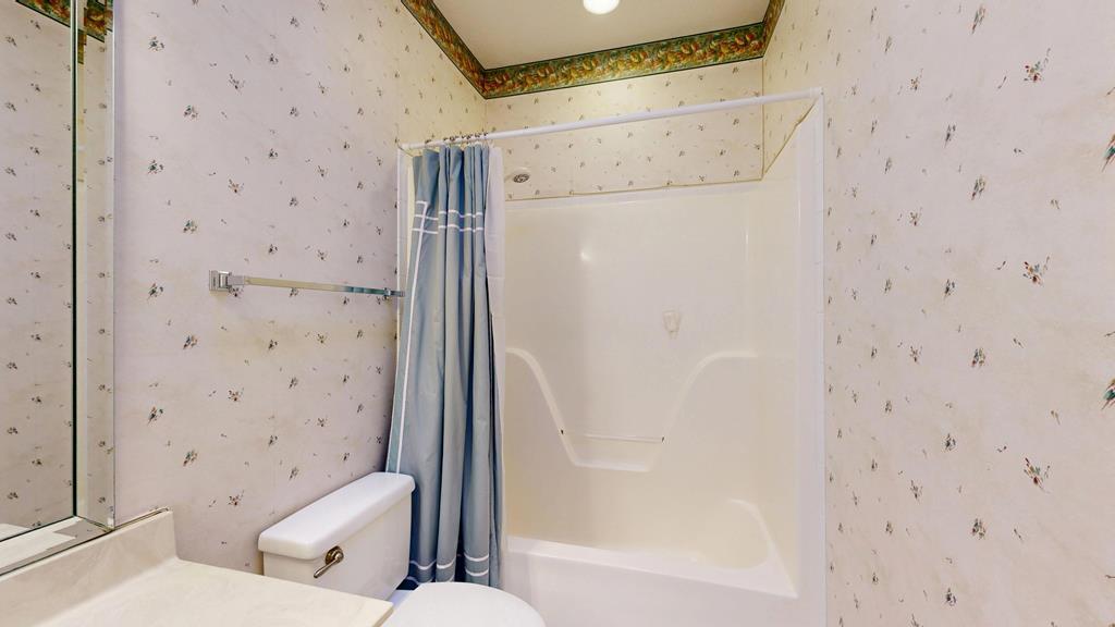 4608 Baltusrol Court Columbus, GA 31909 - Photo 59 of 76 a bathroom with a toilet and shower