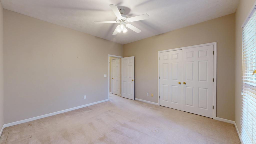 4608 Baltusrol Court Columbus, GA 31909 - Photo 63 of 76 a view of an empty room and a window
