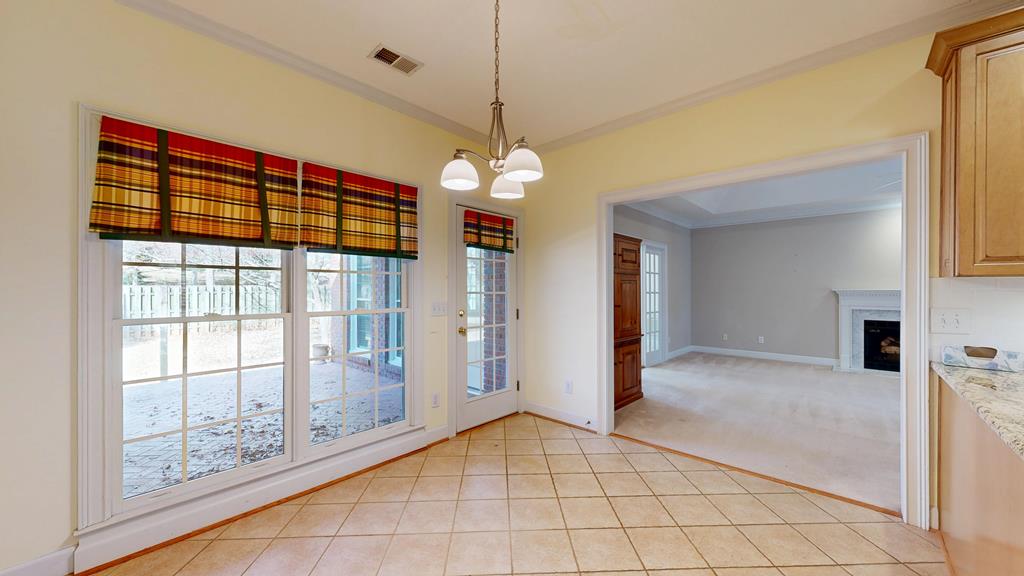 4608 Baltusrol Court Columbus, GA 31909 - Photo 7 of 76 a view of a room with window and chandelier