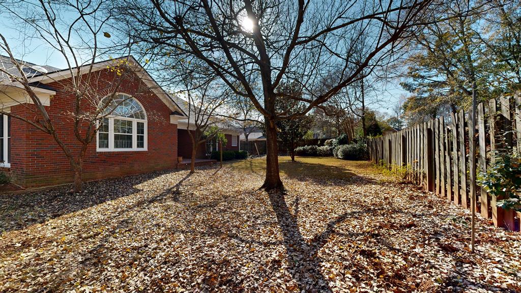 4608 Baltusrol Court Columbus, GA 31909 - Photo 72 of 76 a backyard of a house with lots of green space
