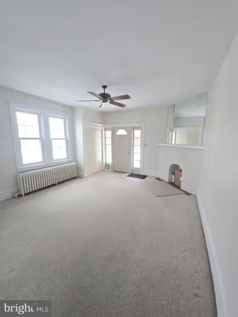 a view of a livingroom with a window