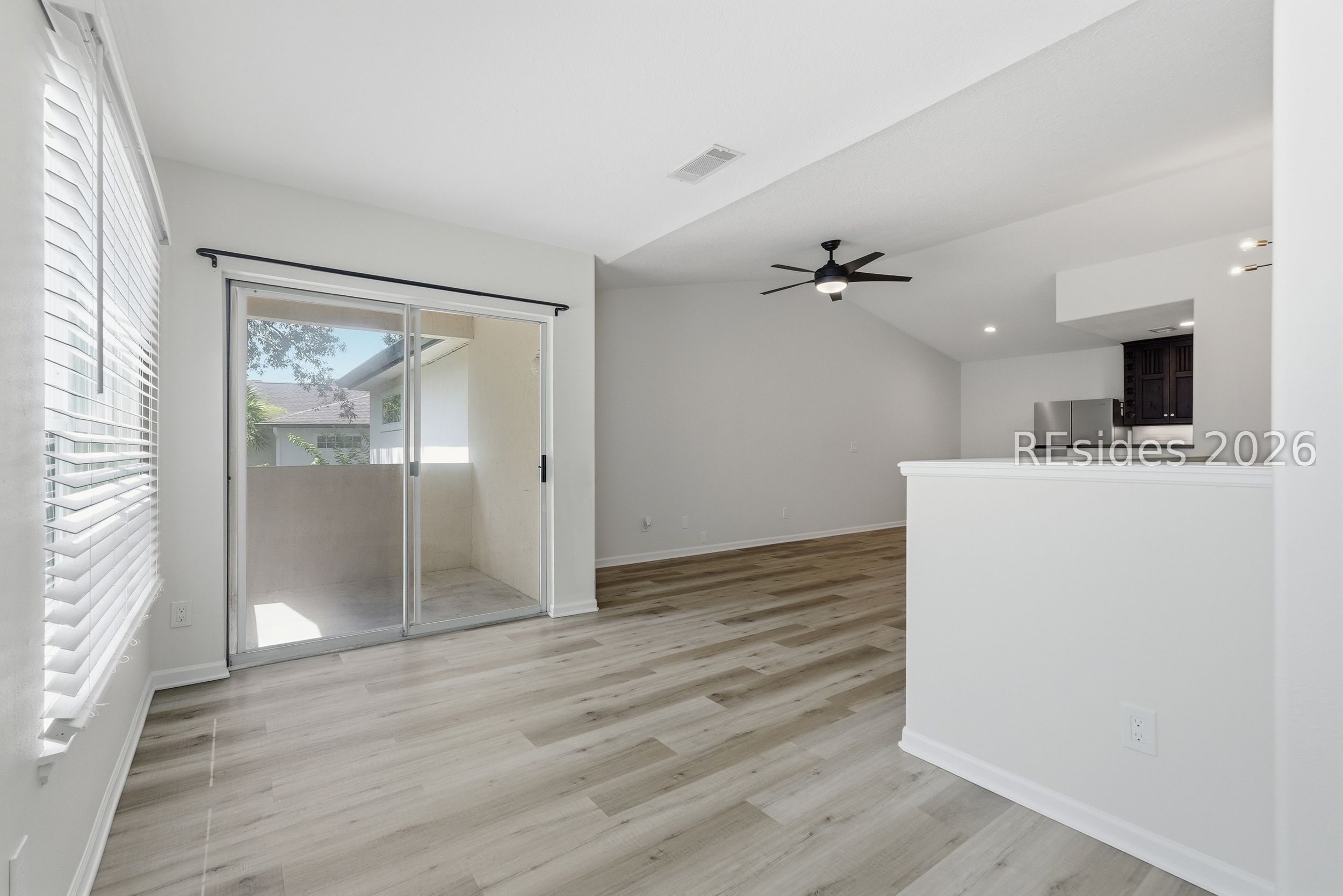 897 Fording Island Road, Unit 1303 Bluffton, SC 29910 - Photo 25 of 48 Large slider door leading to covered balcony.