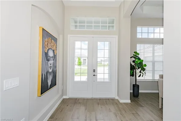 a view of livingroom with hardwood floor and hallway