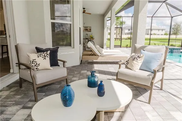 a view of a swimming pool with a deck